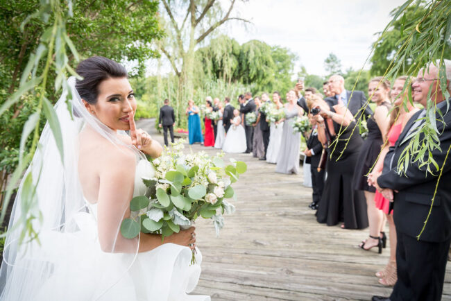 garden-ceremony-wedding-bridal-party-bridge
